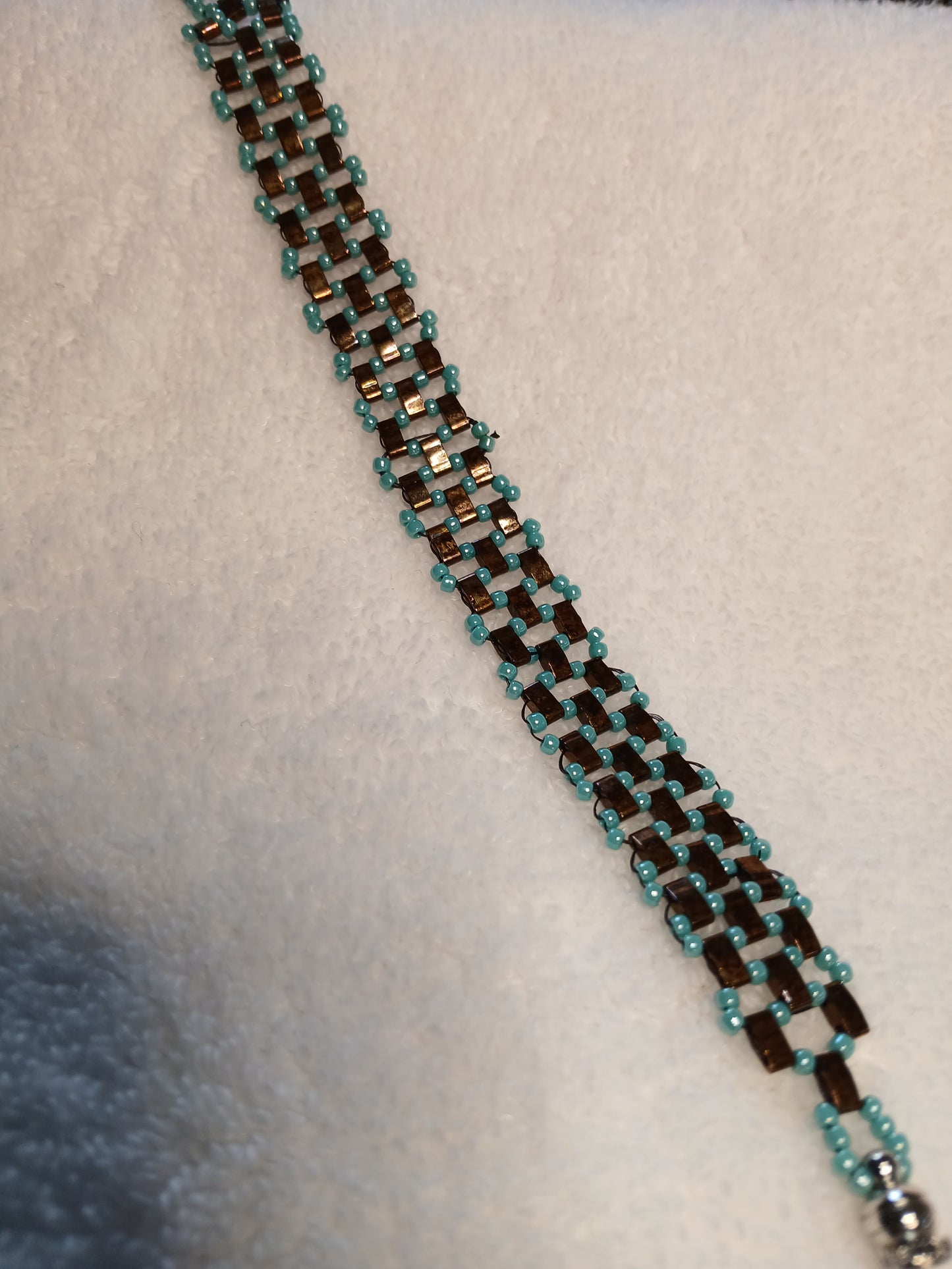 Miyuki Tela and seed bead weaved patterns