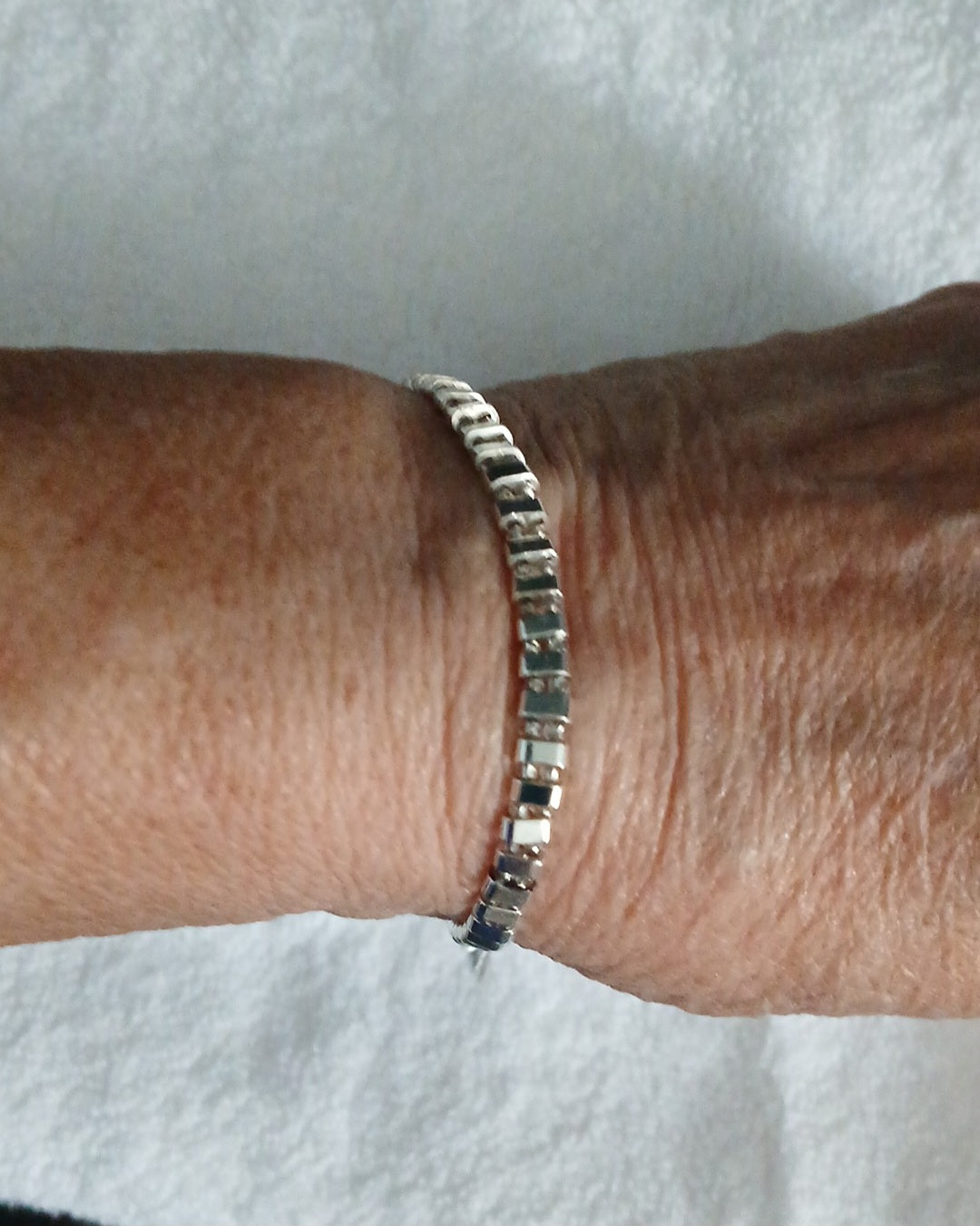 Elegant silver, gold and bronze single row Tila bracelets